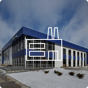 Exterior of a warehouse with a warehouse icon overlaying image.