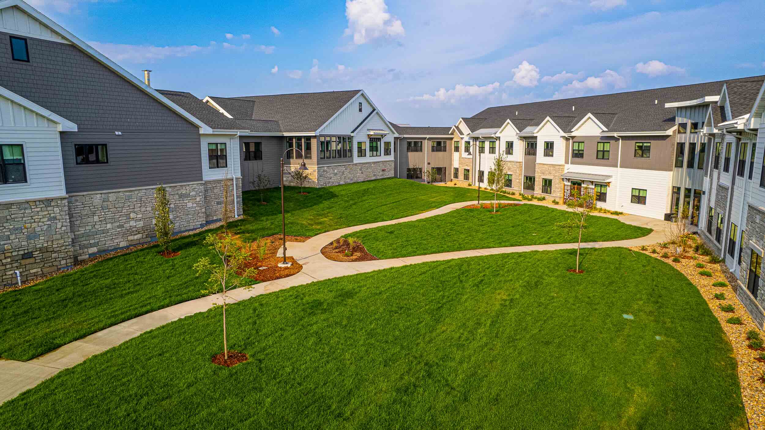 Drone shot of Harmony Hills with green space in the middle.
