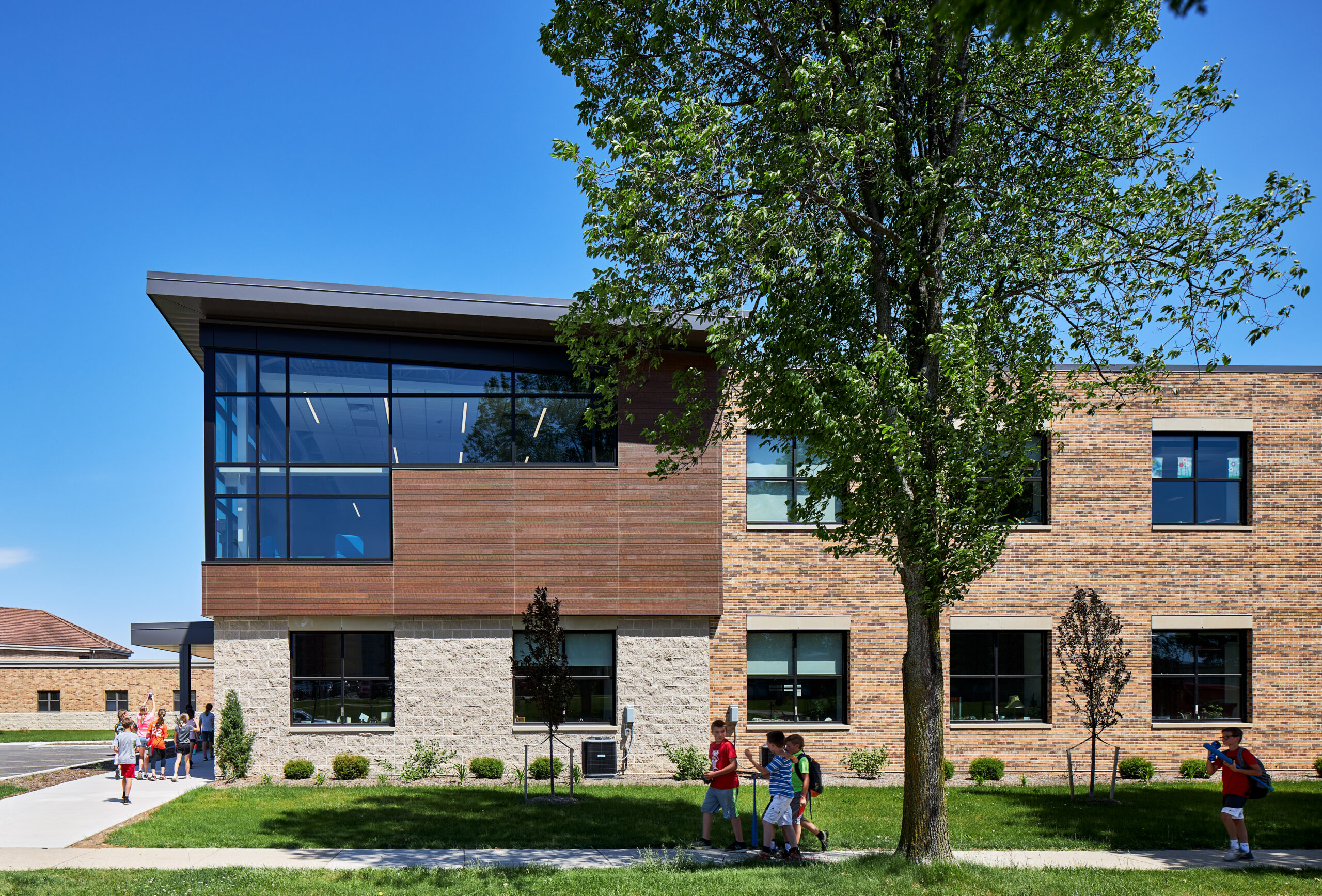 First Immanuel Lutheran exterior with mixed brown shade materials.