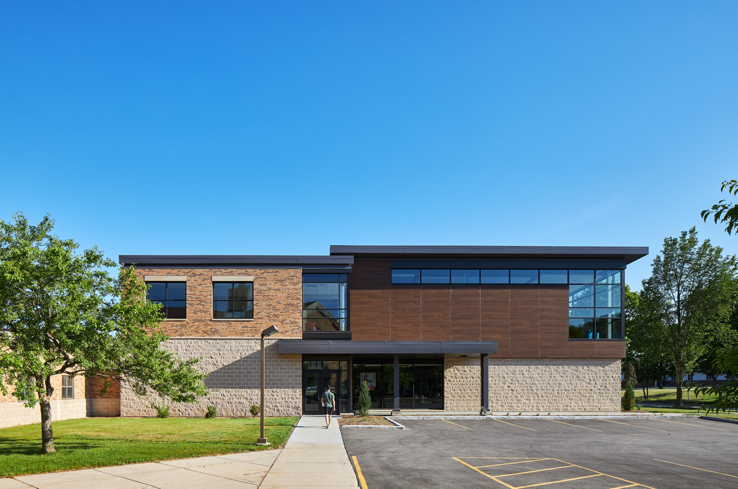 First Immanuel Lutheran exterior with mixed brown shade materials.