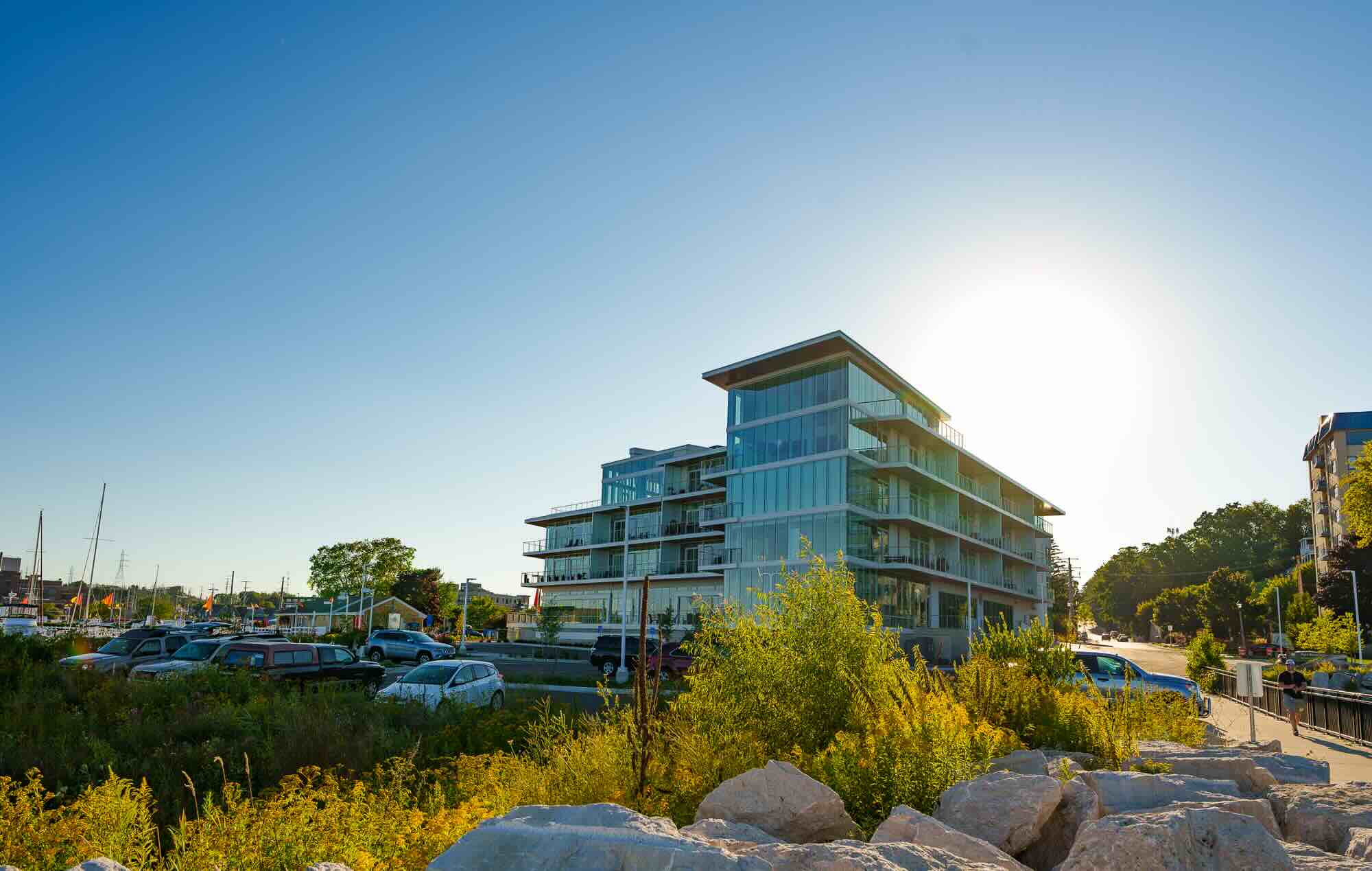 Newport Shores showing a 4-5 storied glass building.