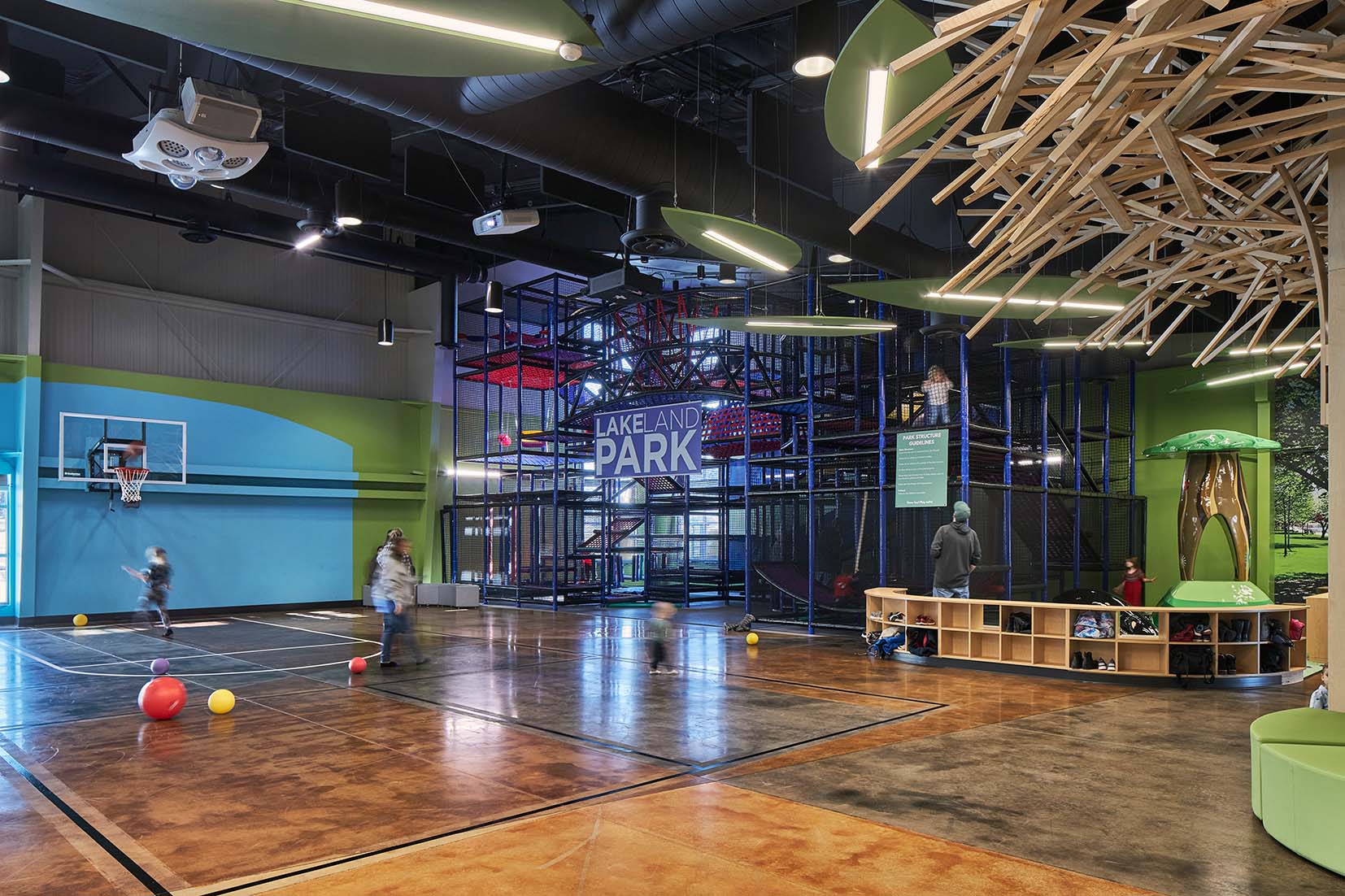 An indoor playground and basketball court at Lakeland Park Church.